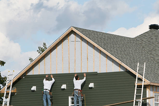Professional Emergency Siding Repair technician working in Valley Grove, WV